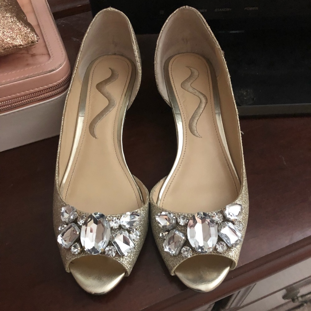 Gold, glittery formal wedges.